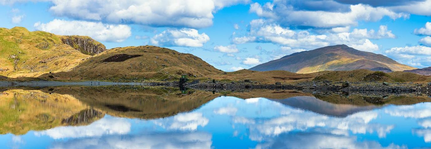 A range of mountains over the lake