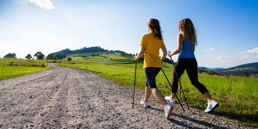 Nordic walking along a path
