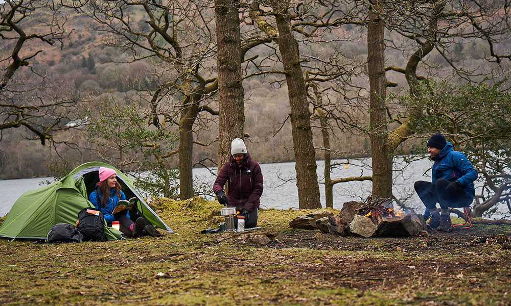 friends camping in forest