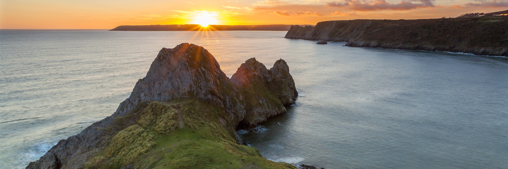 banner-for-3-cliffs-bay.093c9391462a16d1d2a86756c79a8c86