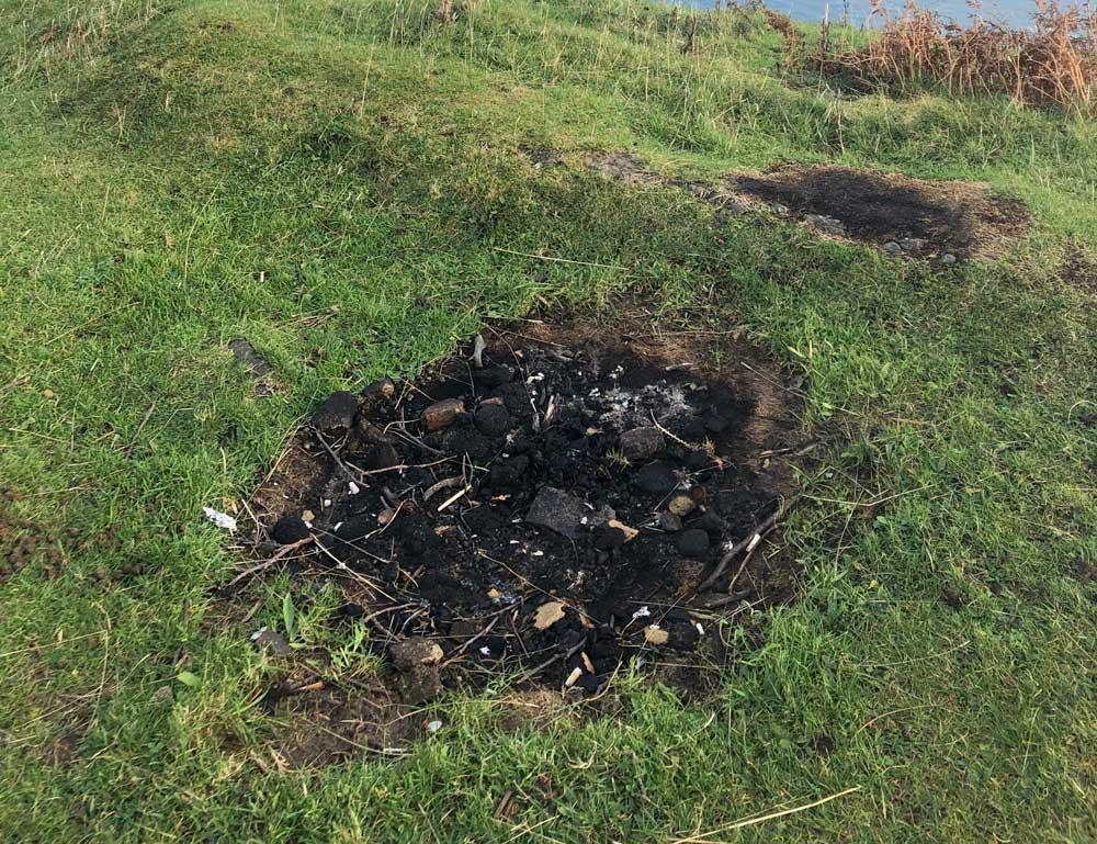 A fire scar on grass