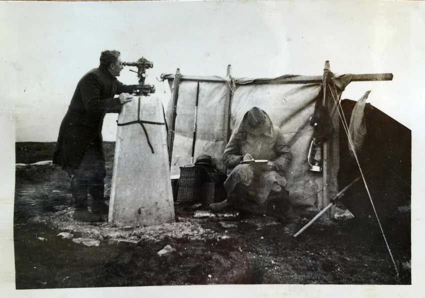 Vintage picture of surveyors at a trig pillar