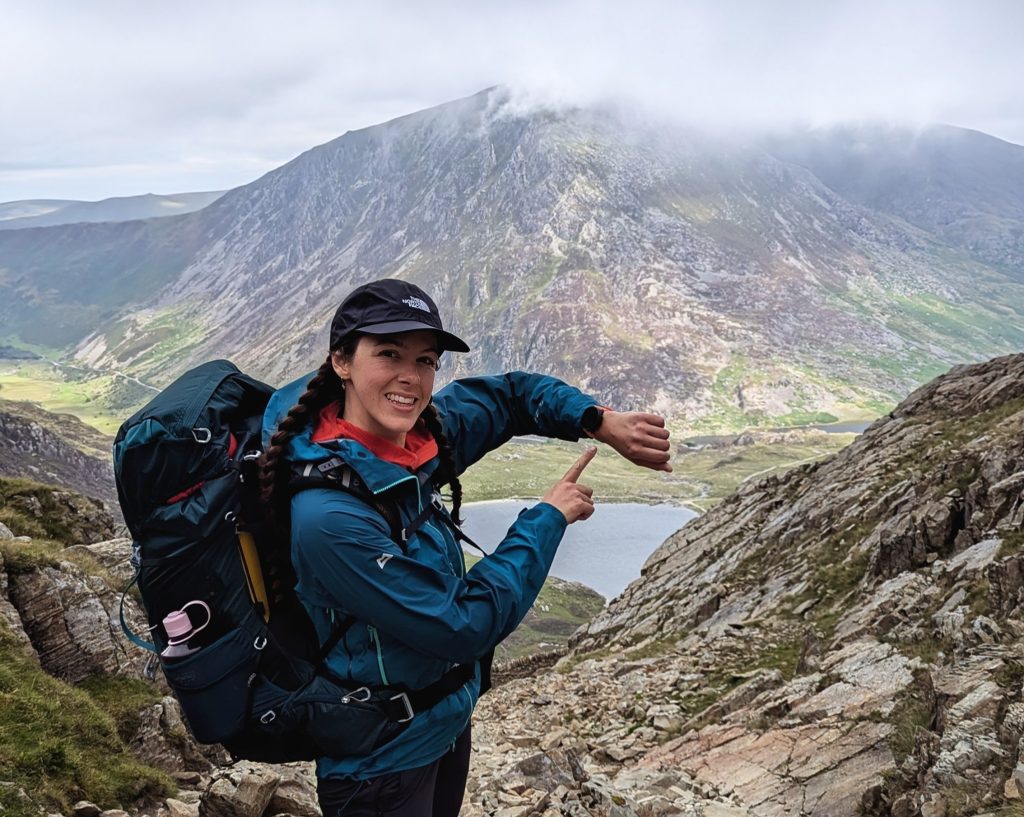 a woman looks at her gps watch