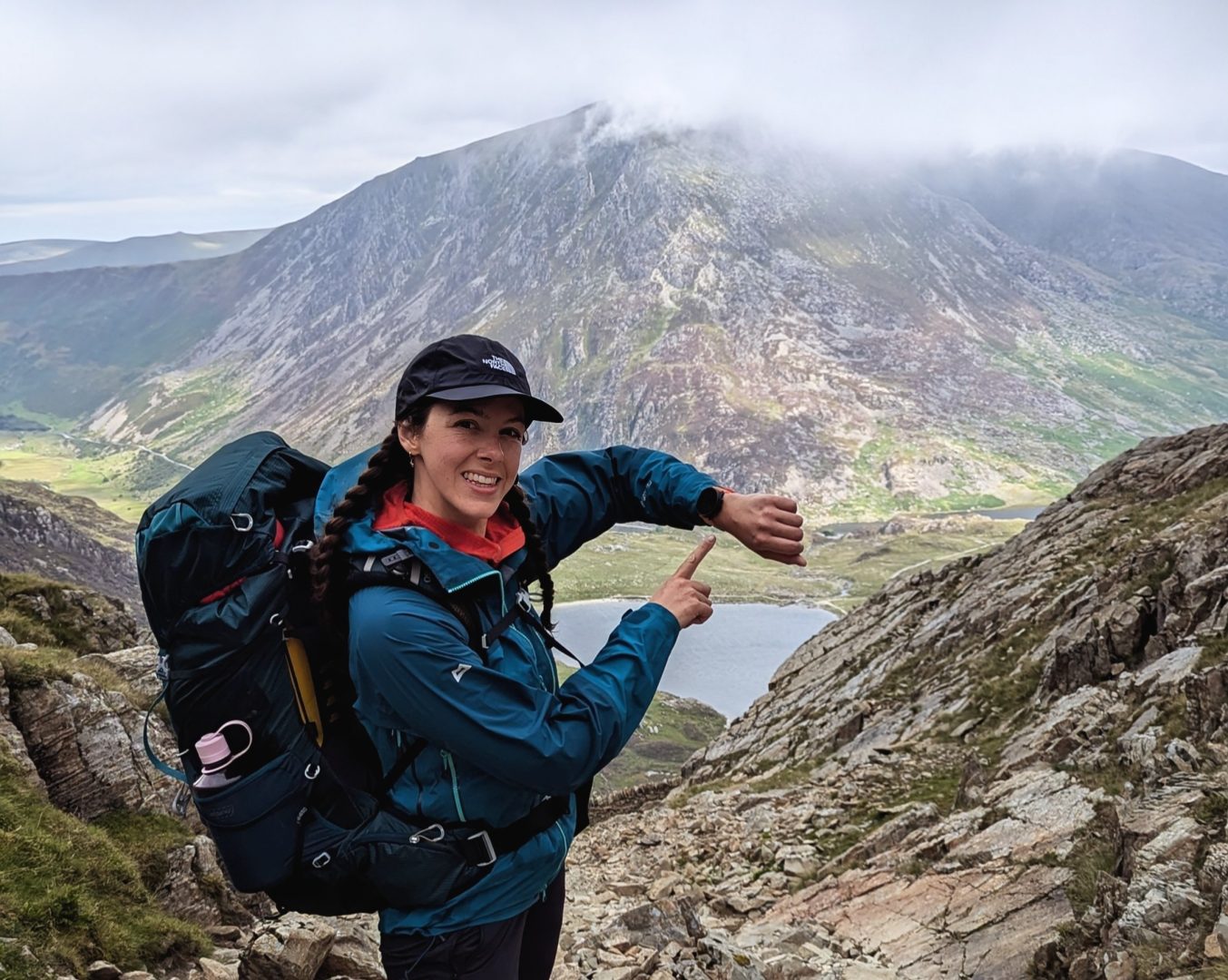 a woman looks at her gps watch