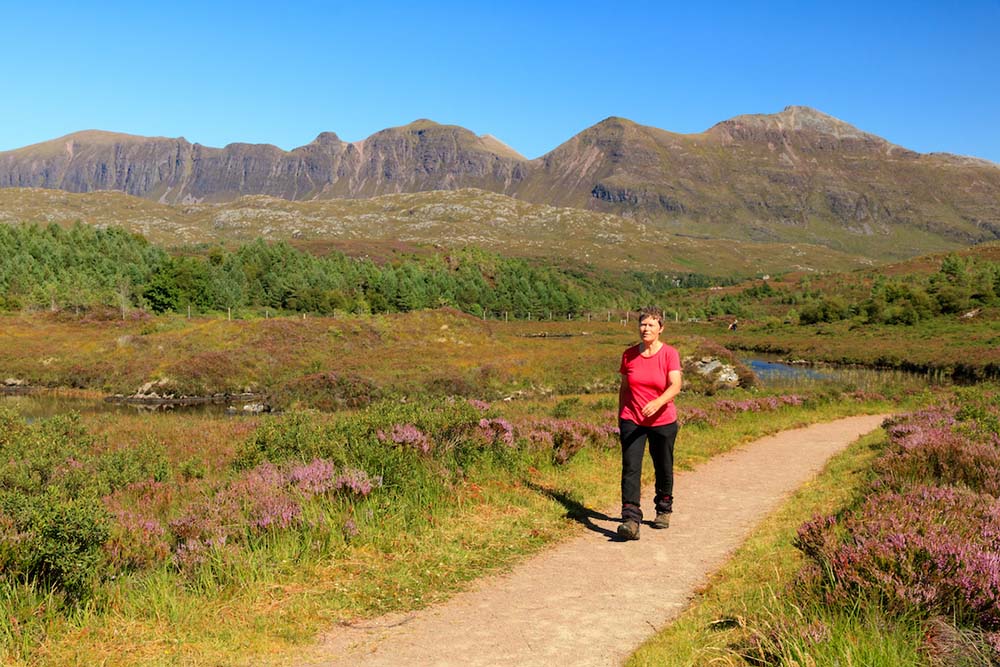 This image of Felicity on the the Little Assynt trail uses the rule of thirds and the path leads the eye into the scene