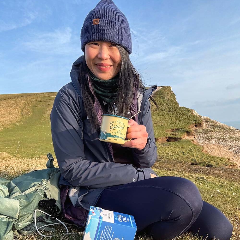 May Cheung drinking coffee