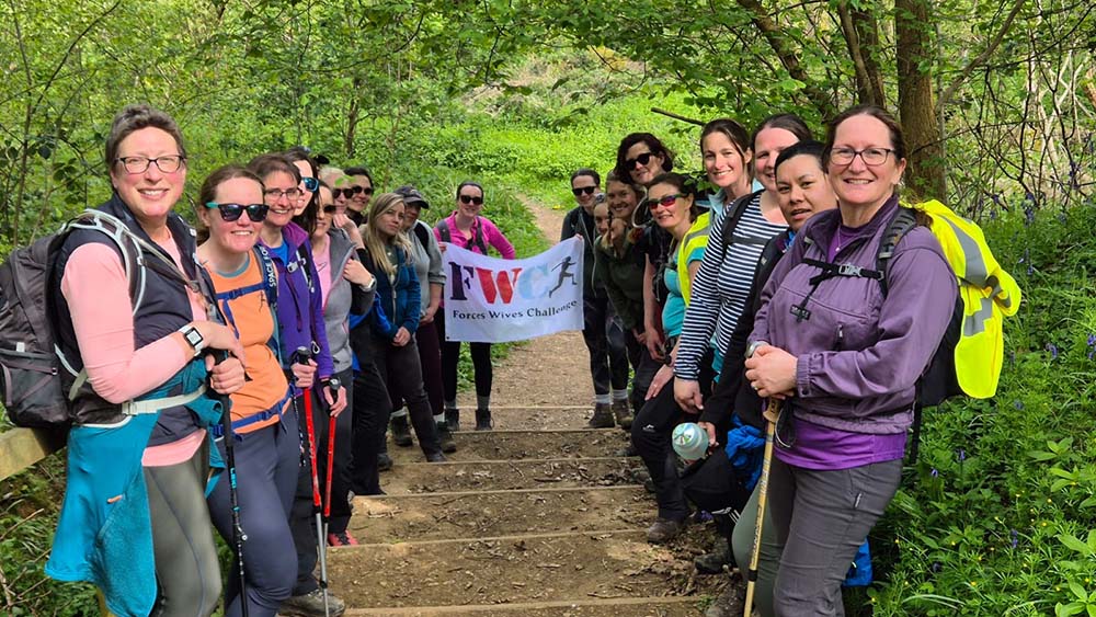 forces wives group image with flag