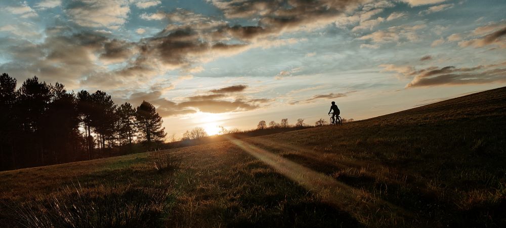 cycling coast to coast at sunset