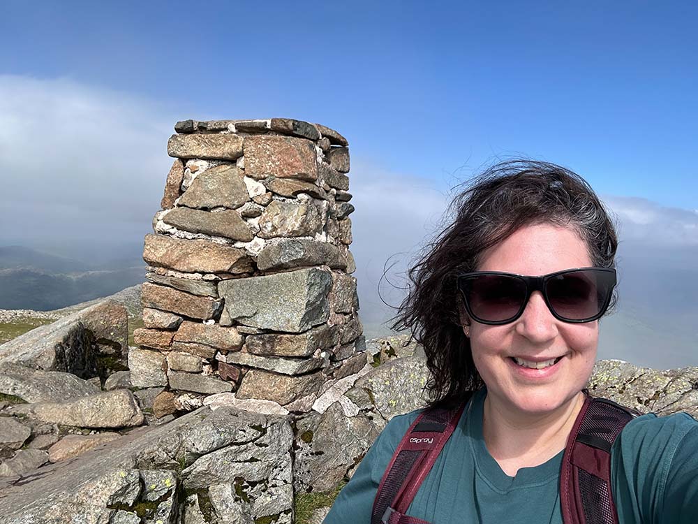 Liz on the trig on Moel Siabod