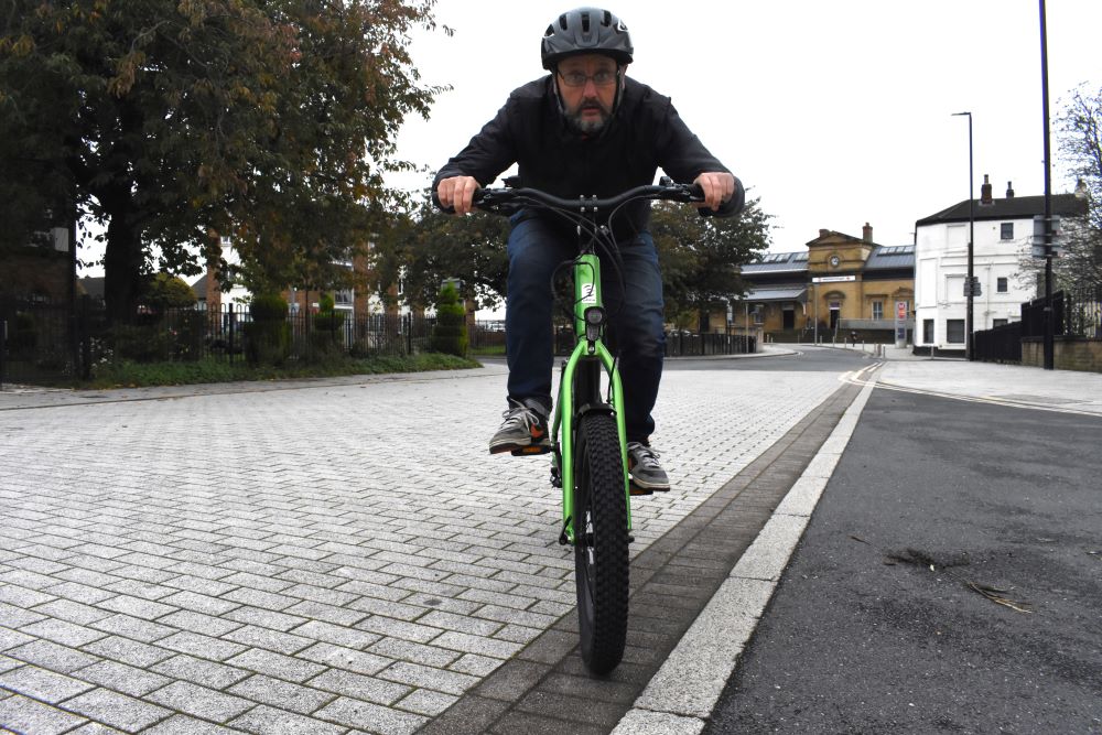 Richard Peace on a bike