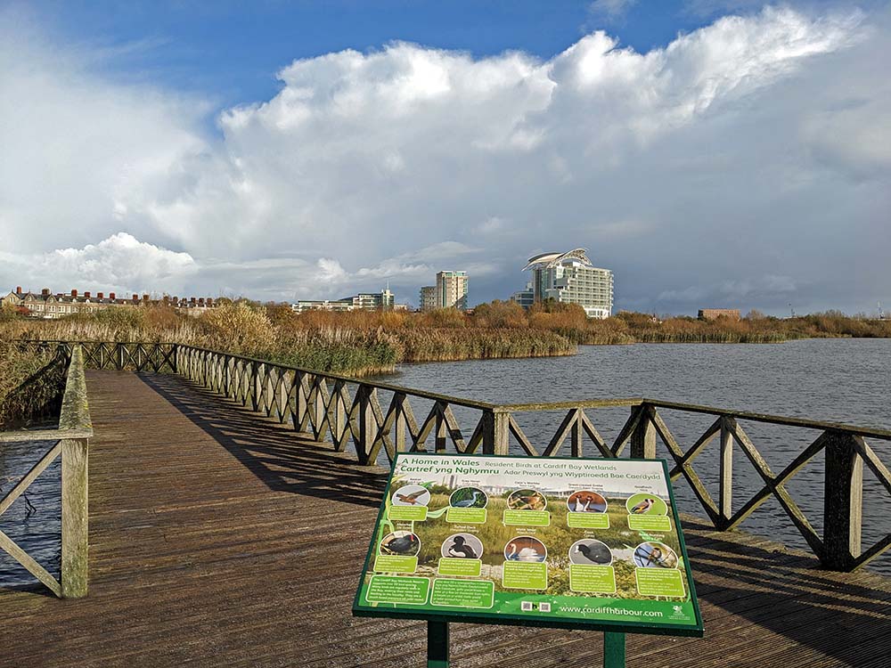 wetlands cardiff bay sign in foreground
