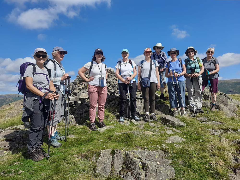 Group of women on a hike on a hill