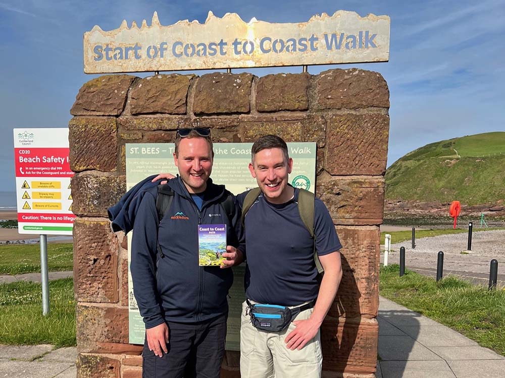 Couple at the start of coast to soast