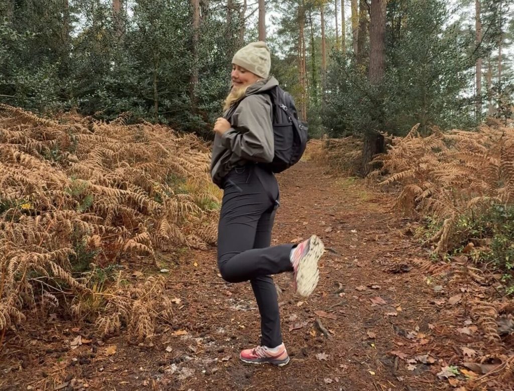 girl having fun in the woods
