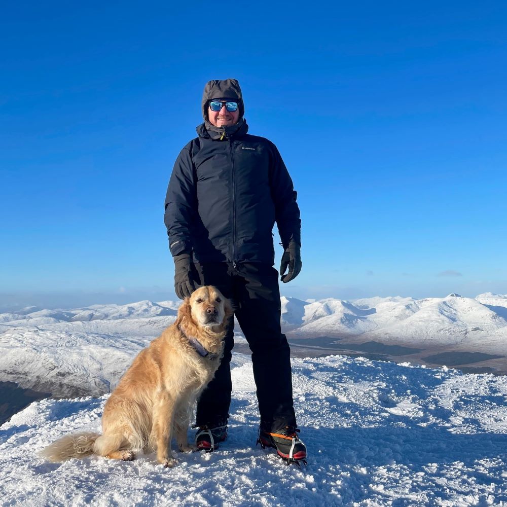Mike Mclaggan and his dog in the snow