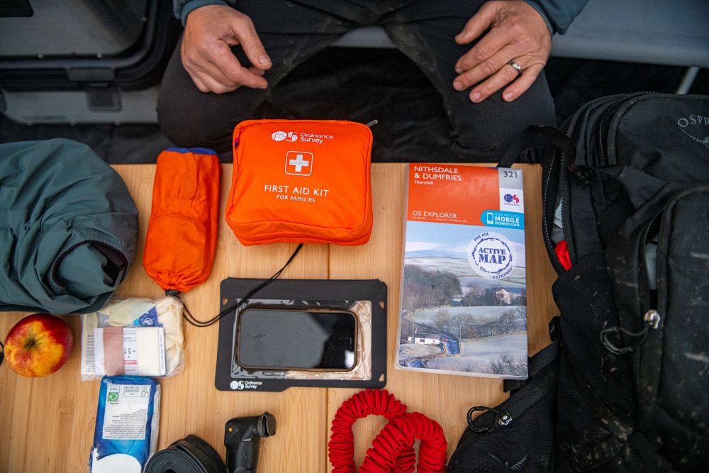 first aid kit and os map