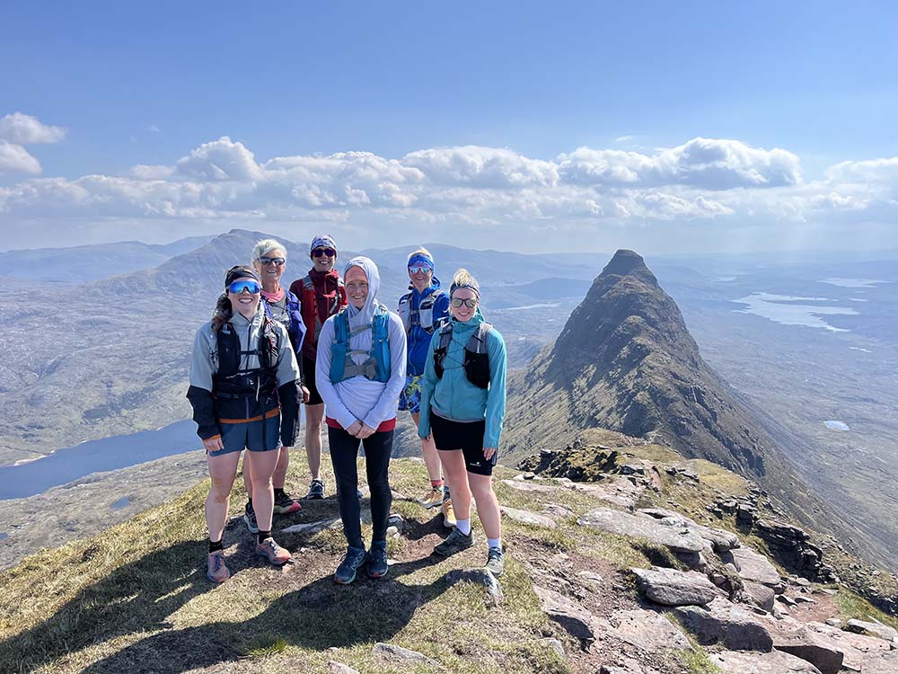 women on top of a ridge