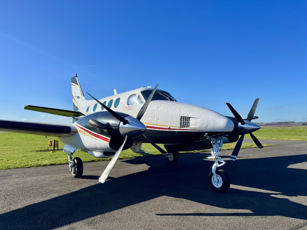 OS flying team plane