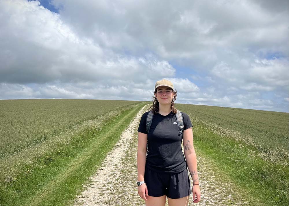 a young woman on the south downs way