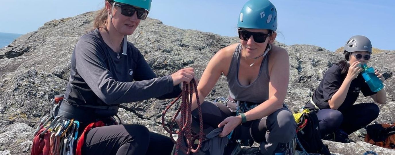 women rock climbers