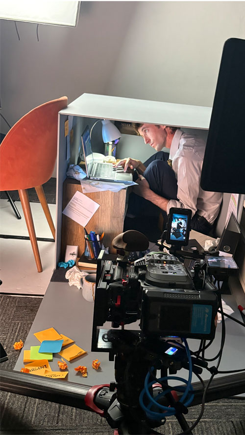 Close up filming a model in a box