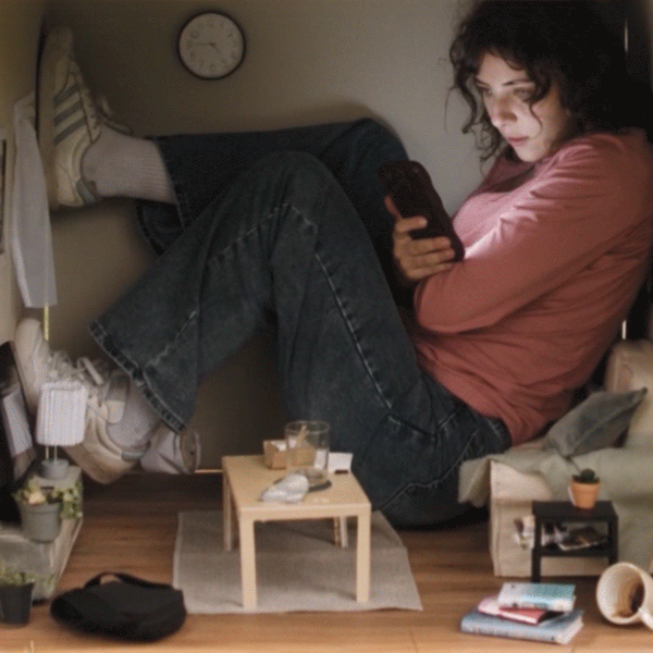 Doomscrolling woman squashed in a box