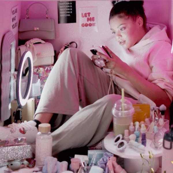 Materialistic woman squashed in a box