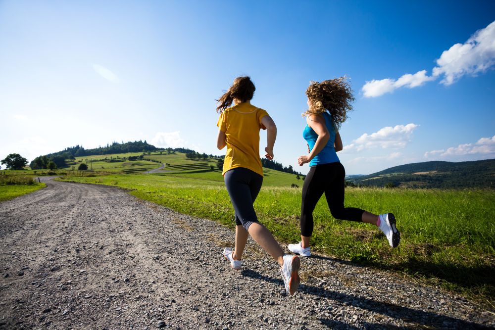 women running in the countryside