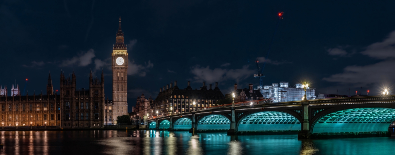 Big Ben and Westminster Bridge lit up at night