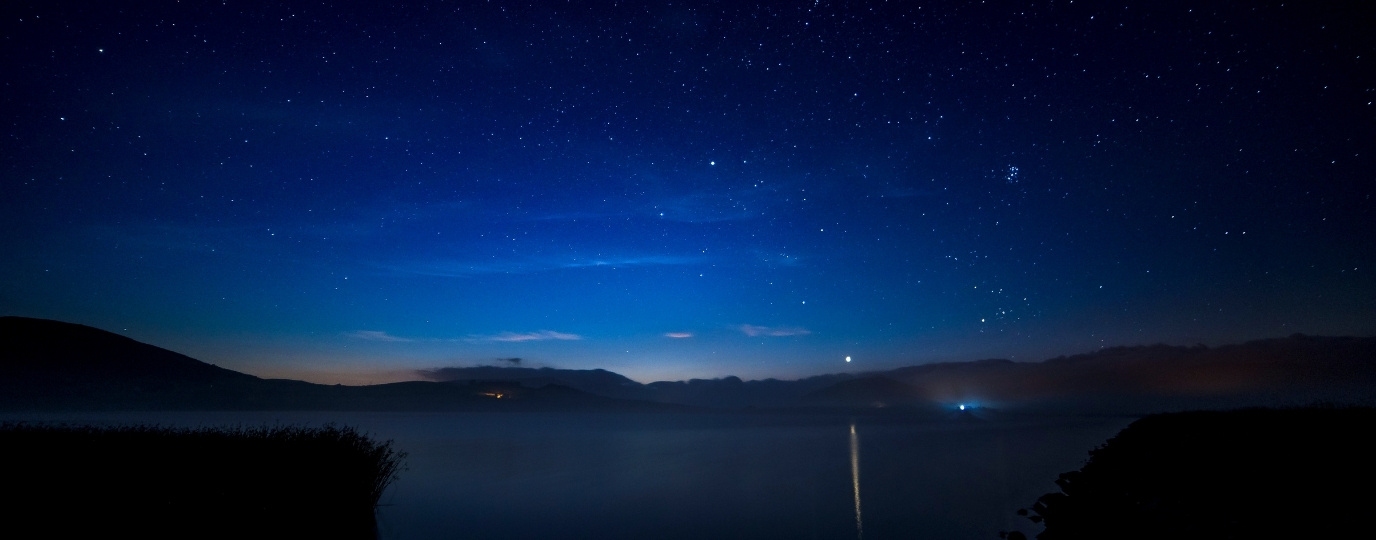Dark skies at night over the Welsh coast