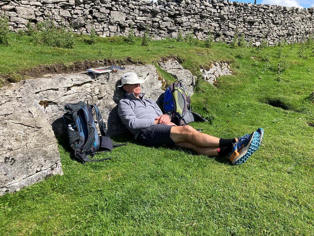 a man snoozing in the sunshine